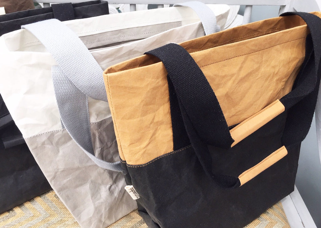 Chooses of plain or two tone combinations. Washable Paper shopping tote.